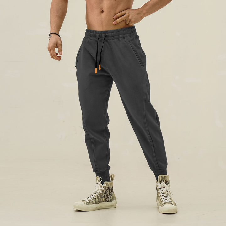 Men's sporty jogging pants with elastic waistband and side pockets Lisslune