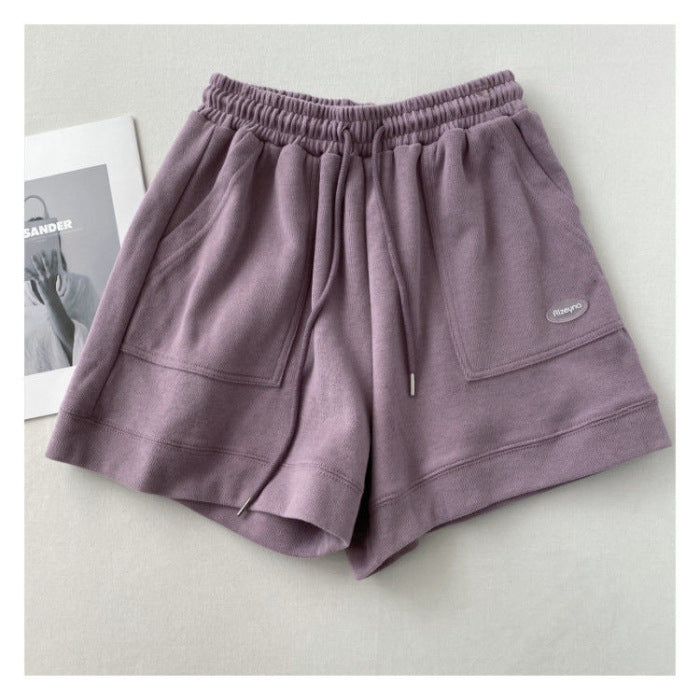 Women's casual jogging shorts with elastic waistband and practical side pockets