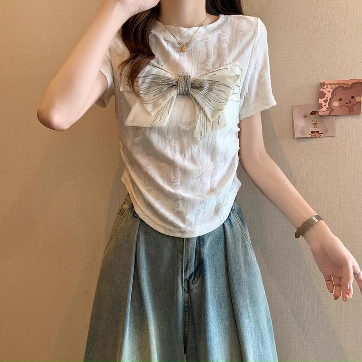 Women's short sleeve shirt with decorative bow detail