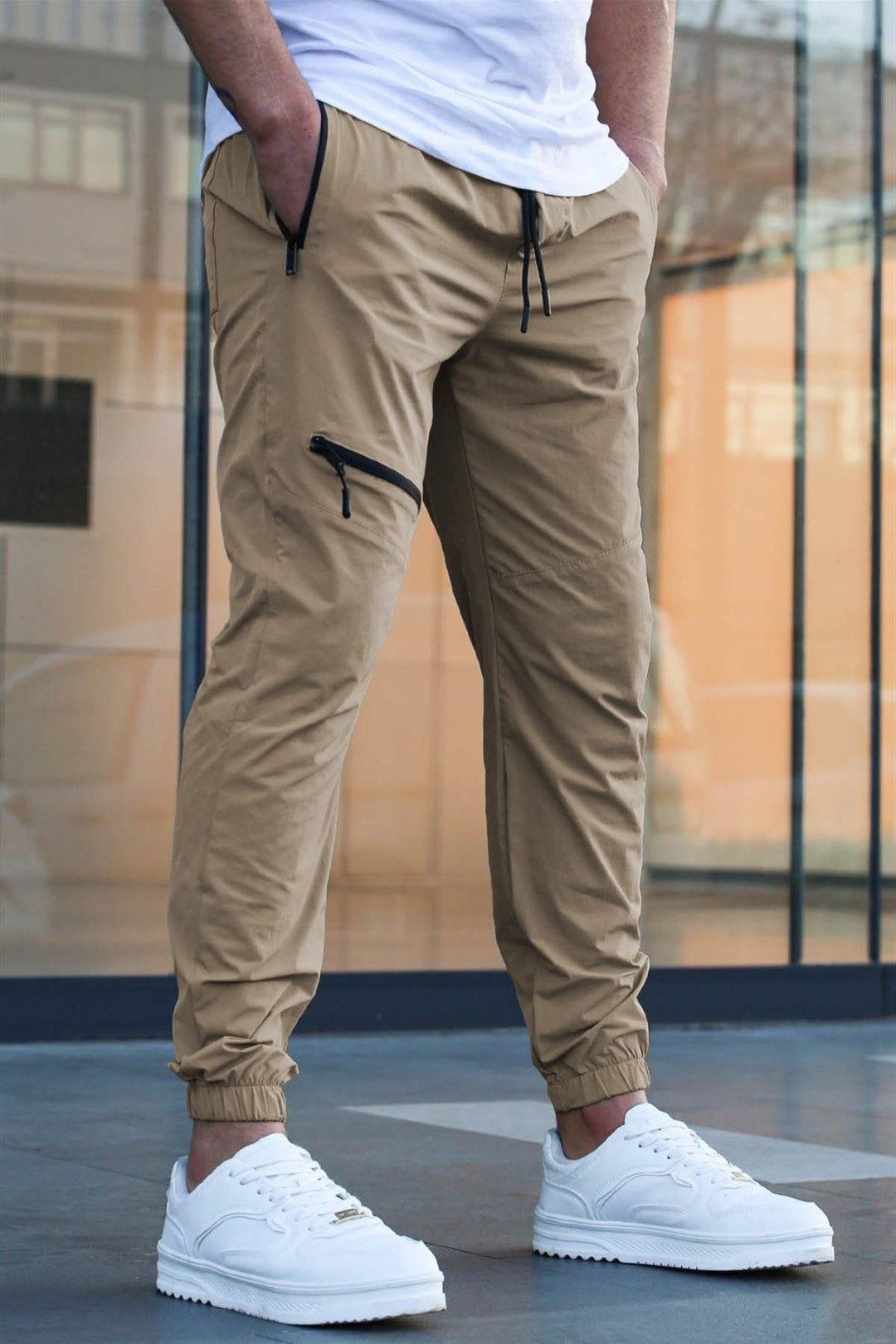 Men's sporty jogging pants with practical zip pockets and elastic waistband Lisslune