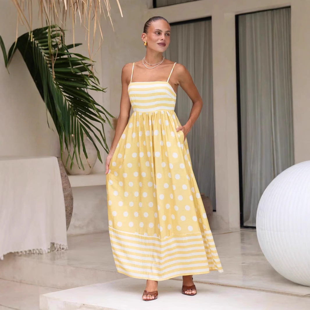 Women's maxi dress with gathered bodice and playful polka dot and stripe pattern Lune London