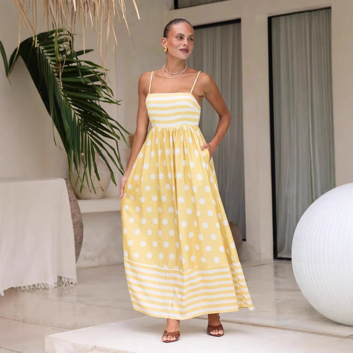Women's maxi dress with gathered bodice and playful polka dot and stripe pattern Lune London