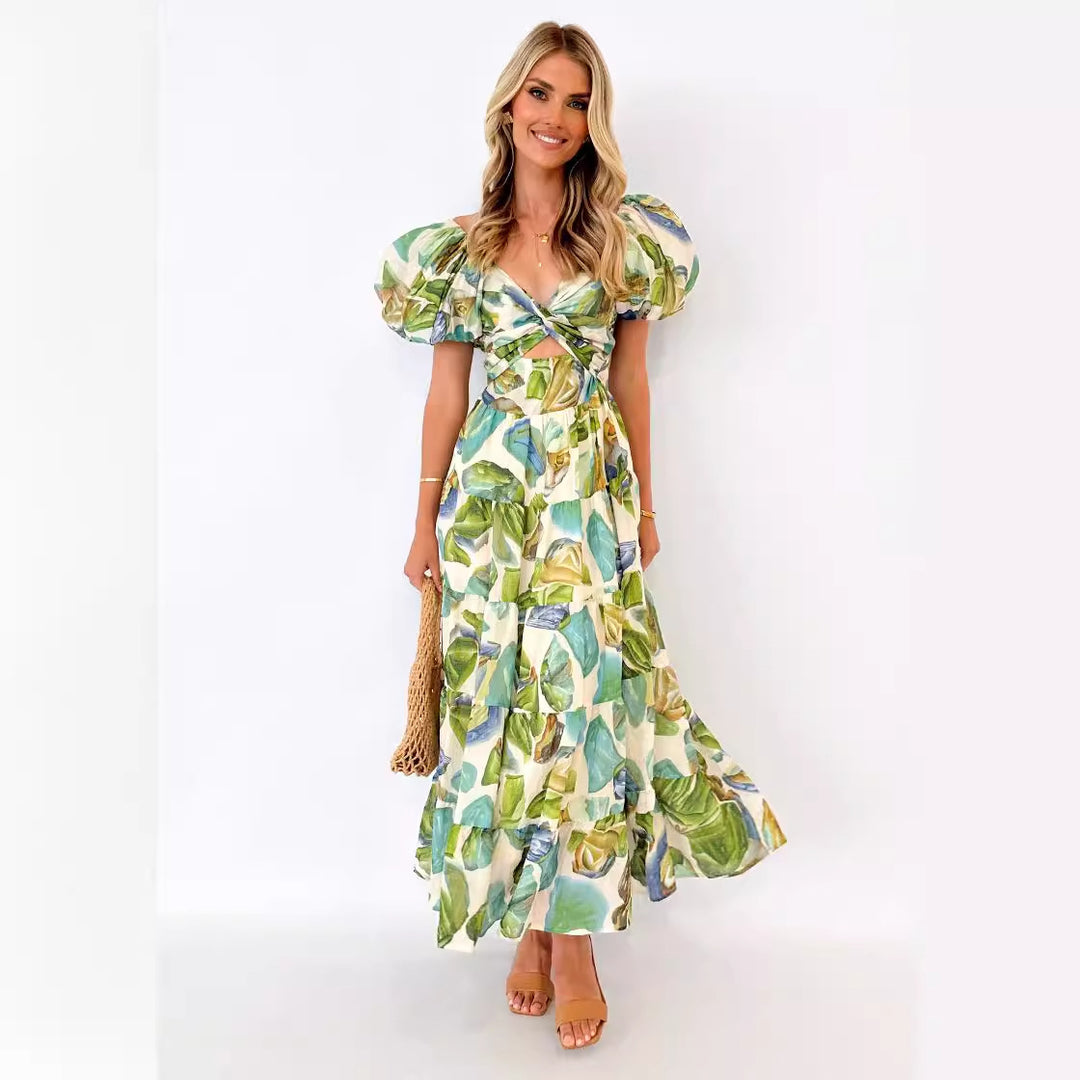Women's maxi dress with voluminous puff sleeves and floral pattern
