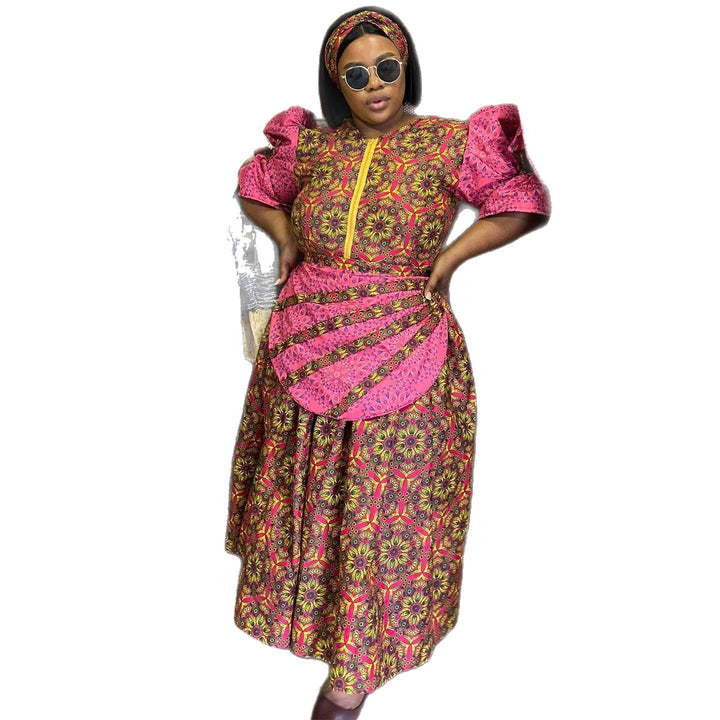 Women's maxi dress with elegant floral pattern and voluminous sleeves