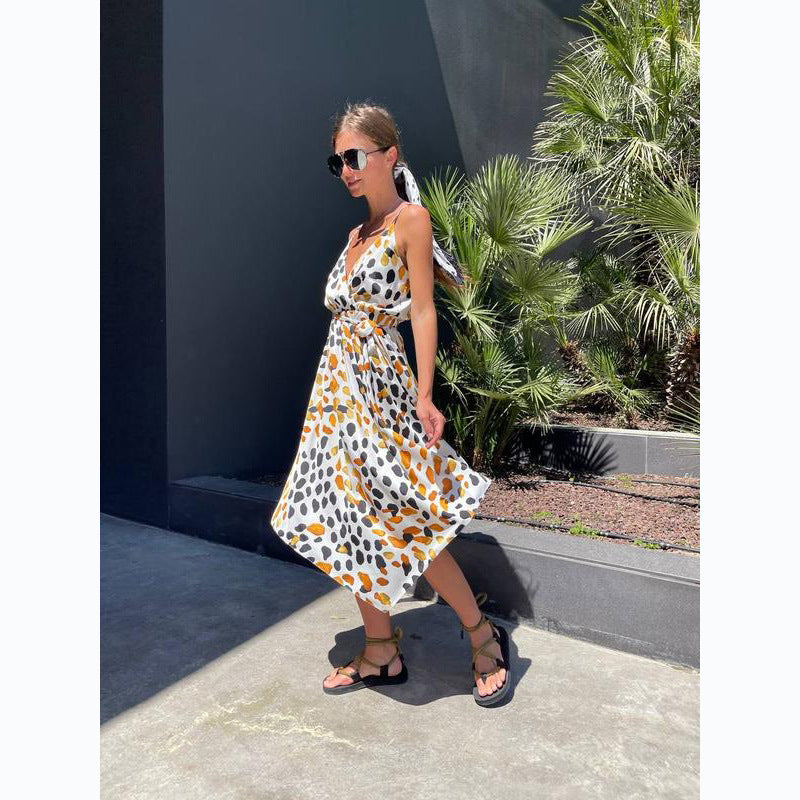 Women's maxi dress with elegant wrap design and stylish ruffle details
