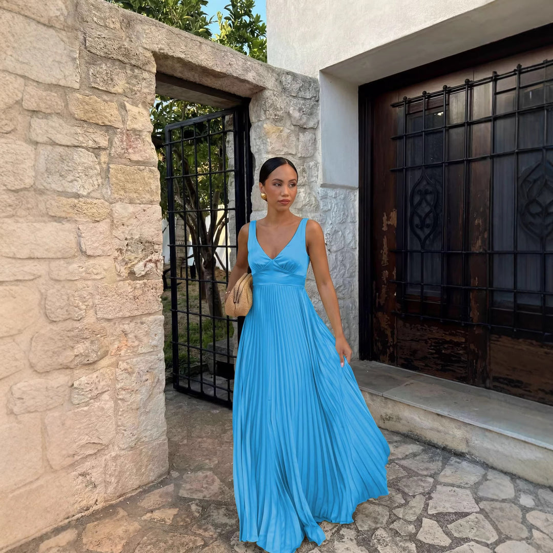 Women's pleated dress with deep V-neckline and elegant silhouette