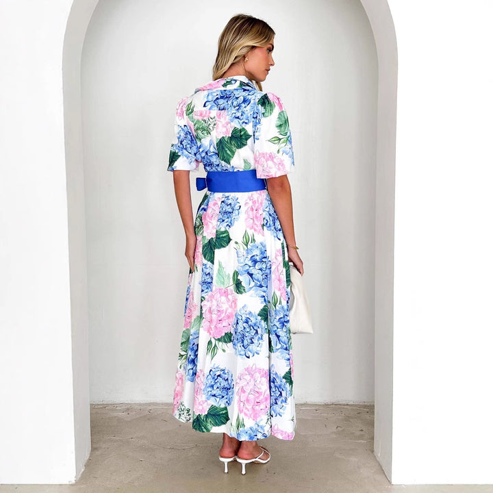 Women's maxi dress with pleats and waist belt