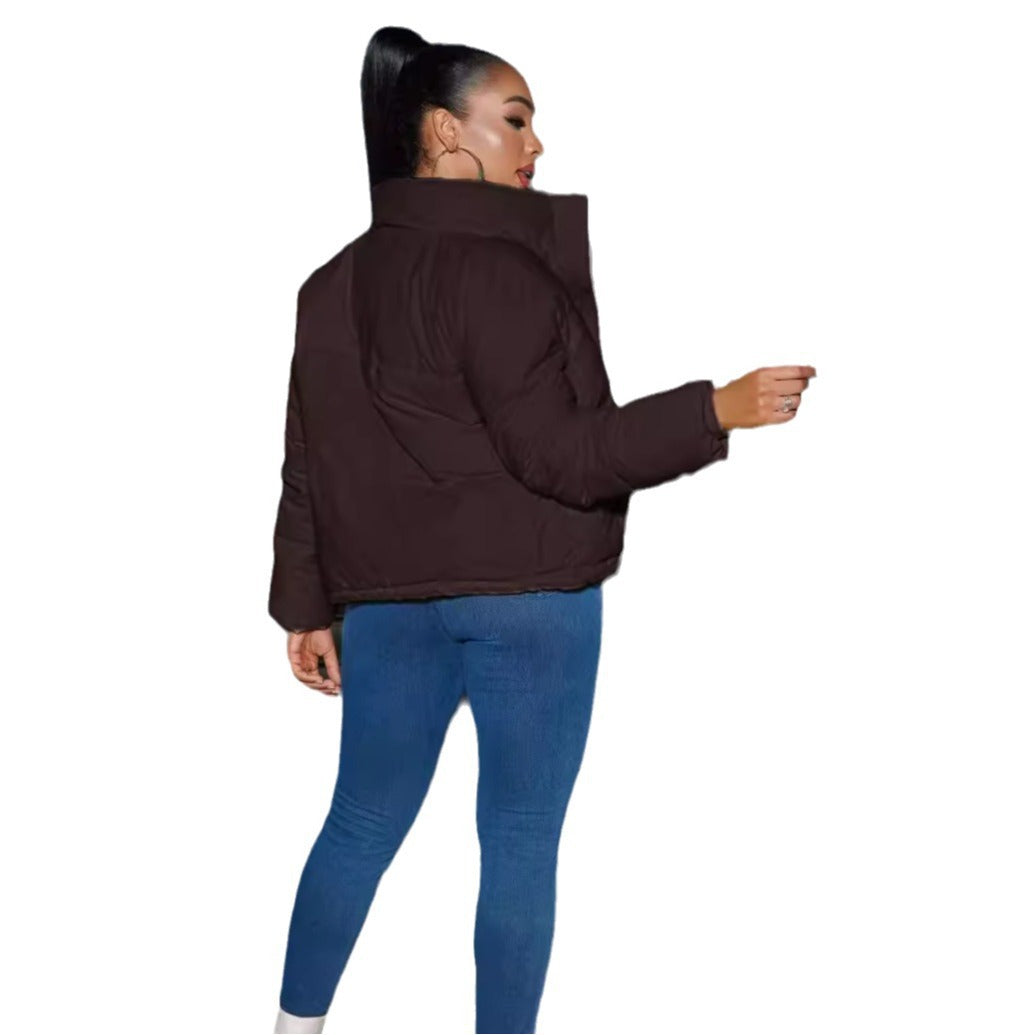 Women's quilted jacket with high collar and fitted cut