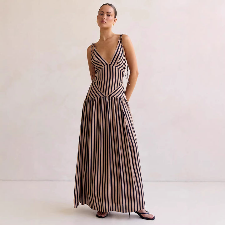 Women's maxi dress with deep V-neckline and elegant striped design