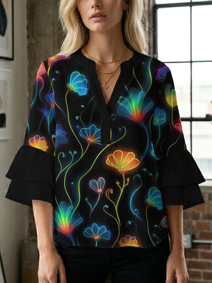 Women’s blouse with voluminous ruffled sleeves and floral pattern Lisslune