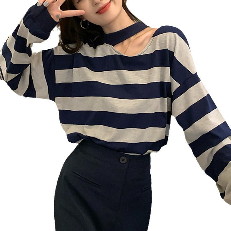 Women’s long sleeve shirt with modern stripes and an elegant neckline