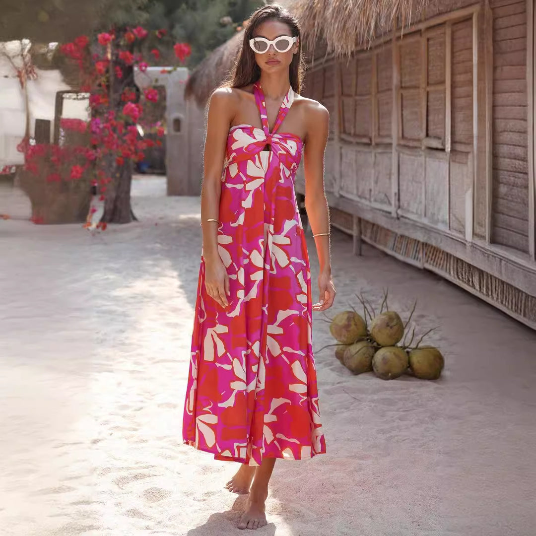 Women's maxi dress with floral bandeau design and elegant flared skirt