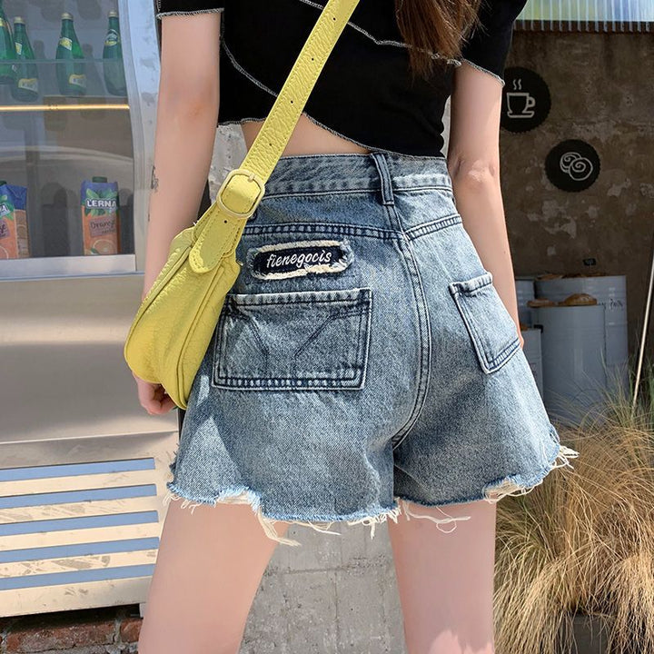 Women's denim shorts with frayed hems and unique embroidery detail Lisslune