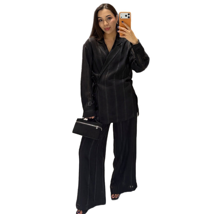 Women's set of stylish oversized blazer and wide-cut trousers