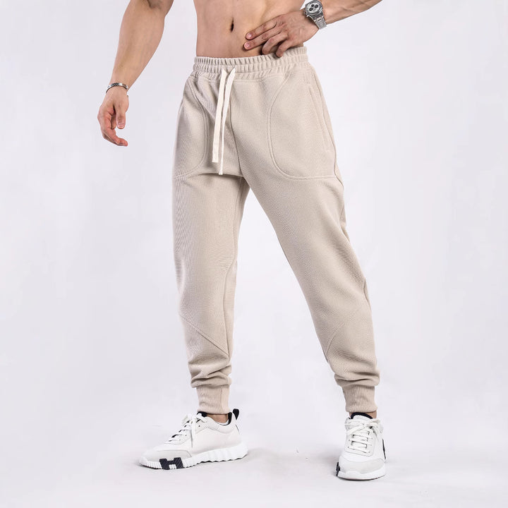 Men's sporty jogging pants with breathable inserts and elastic waistband Lisslune