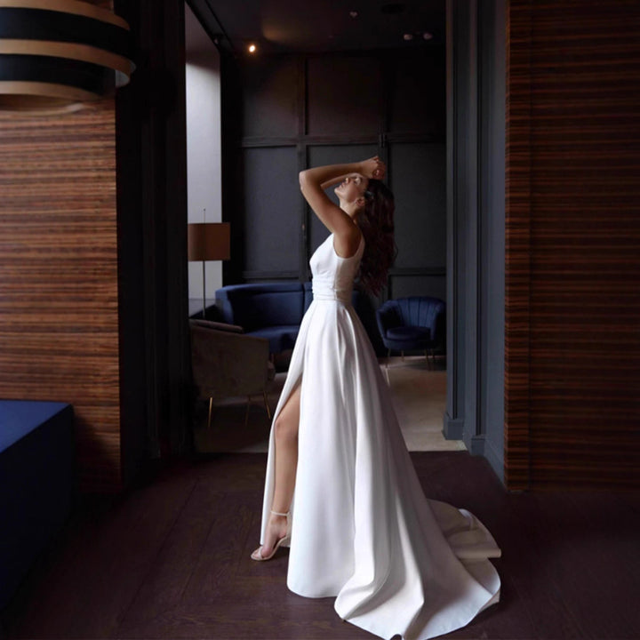 Women's elegant wedding dress with deep V-neckline and side slit