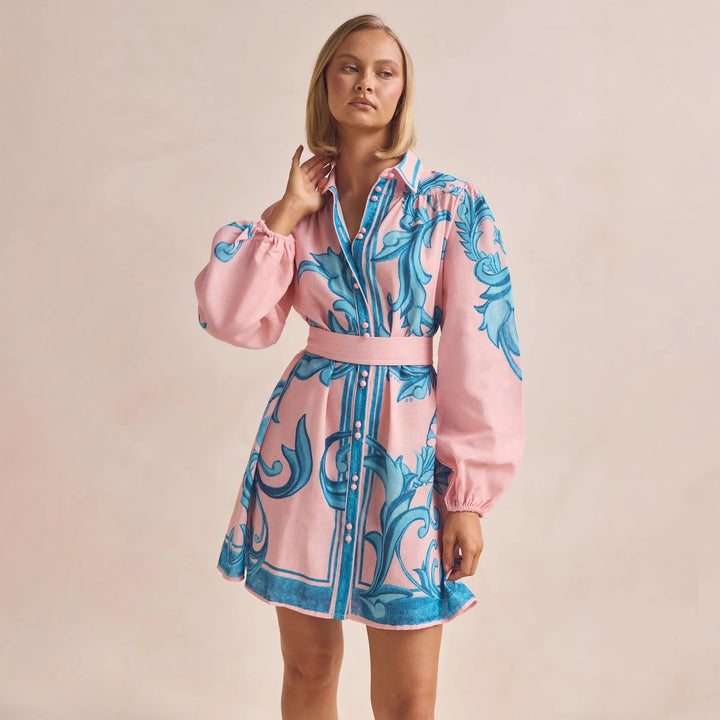Ladies shirt dress with smooth puff sleeves and floral design