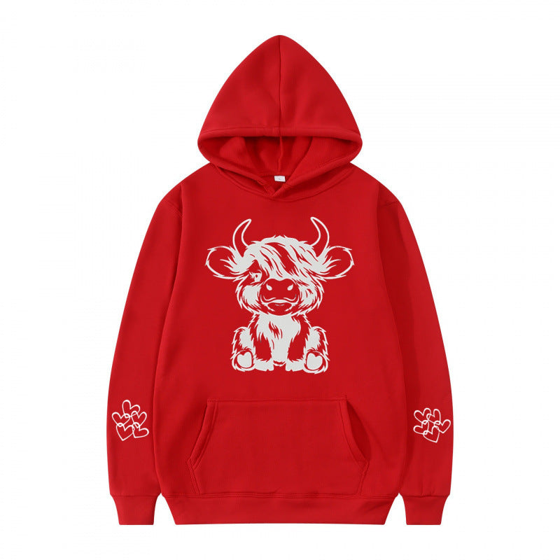 Women's hooded sweatshirt with charming cow motif and practical kangaroo pockets Lisslune