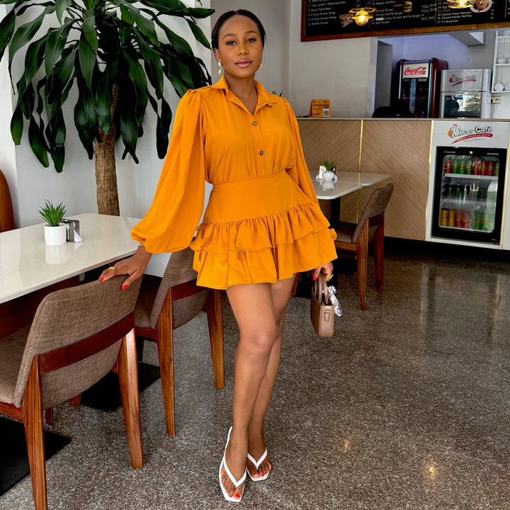 Women's shirt dress with voluminous puff sleeves and flowing skirt
