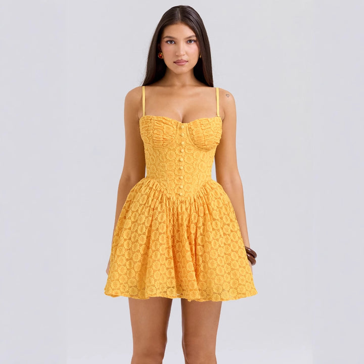 Ladies summery bustier dress with playful ruffles and refined button details