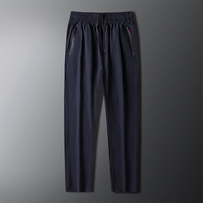 Men's sporty jogging pants with elastic waistband and side zipper Lisslune
