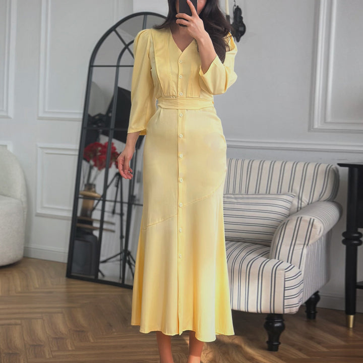 Women's maxi dress with button placket and elegant puff sleeves