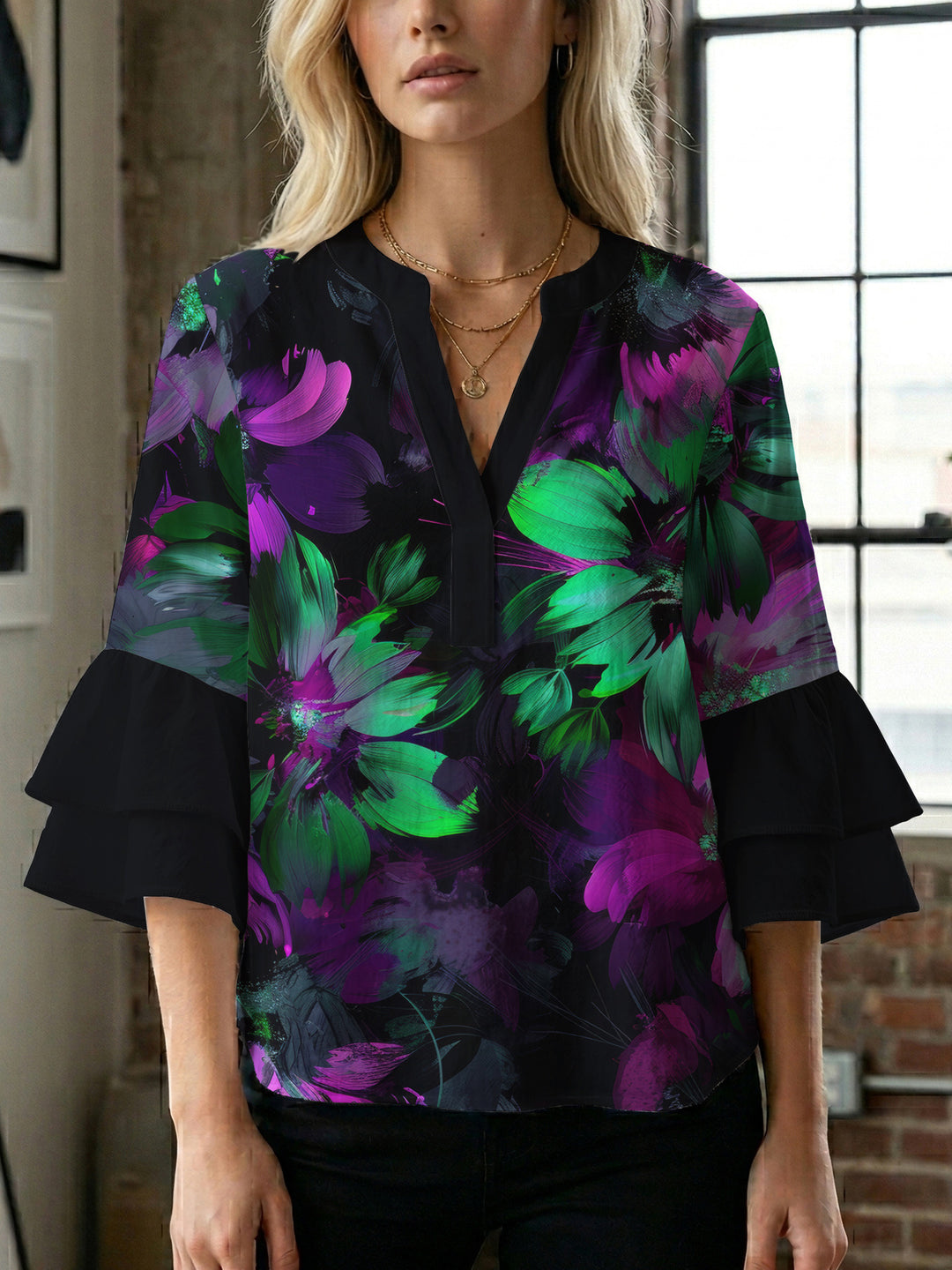 Women’s blouse with voluminous ruffled sleeves and floral pattern Lisslune