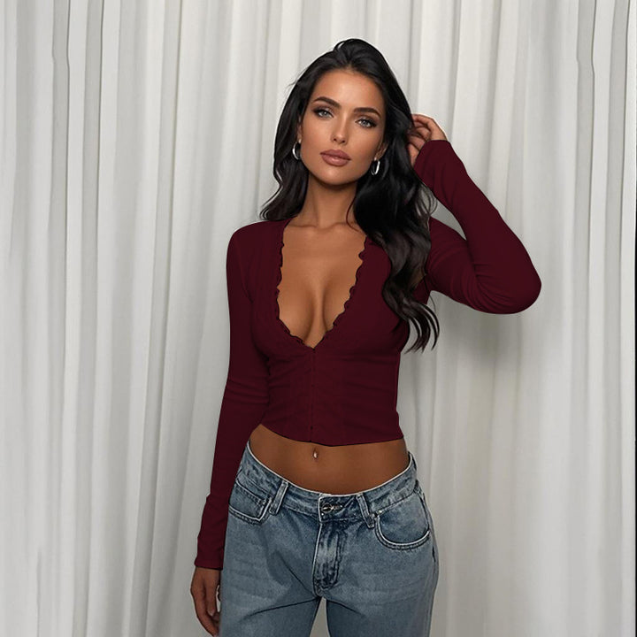 Women's long-sleeved top with deep V-neck and decorative ruffle design