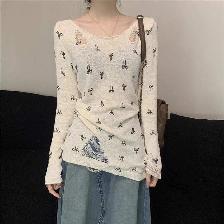Women's long sleeve shirt with stylish rips and playful motif Lisslune