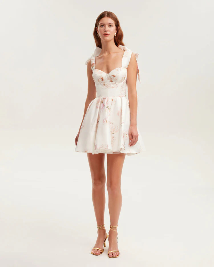 Women's Playful Mini Dress with Floral Design and Sophisticated Straps