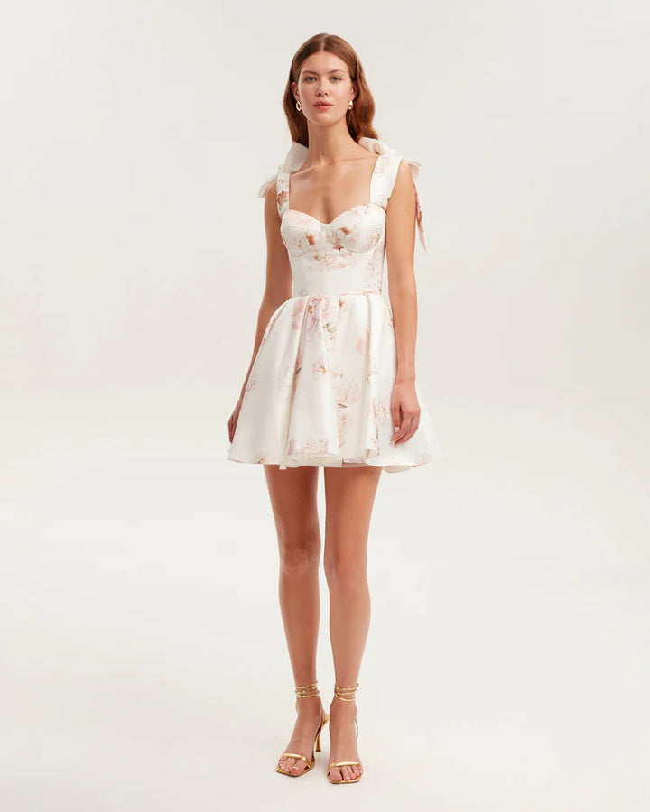 Women's Playful Mini Dress with Floral Design and Sophisticated Straps