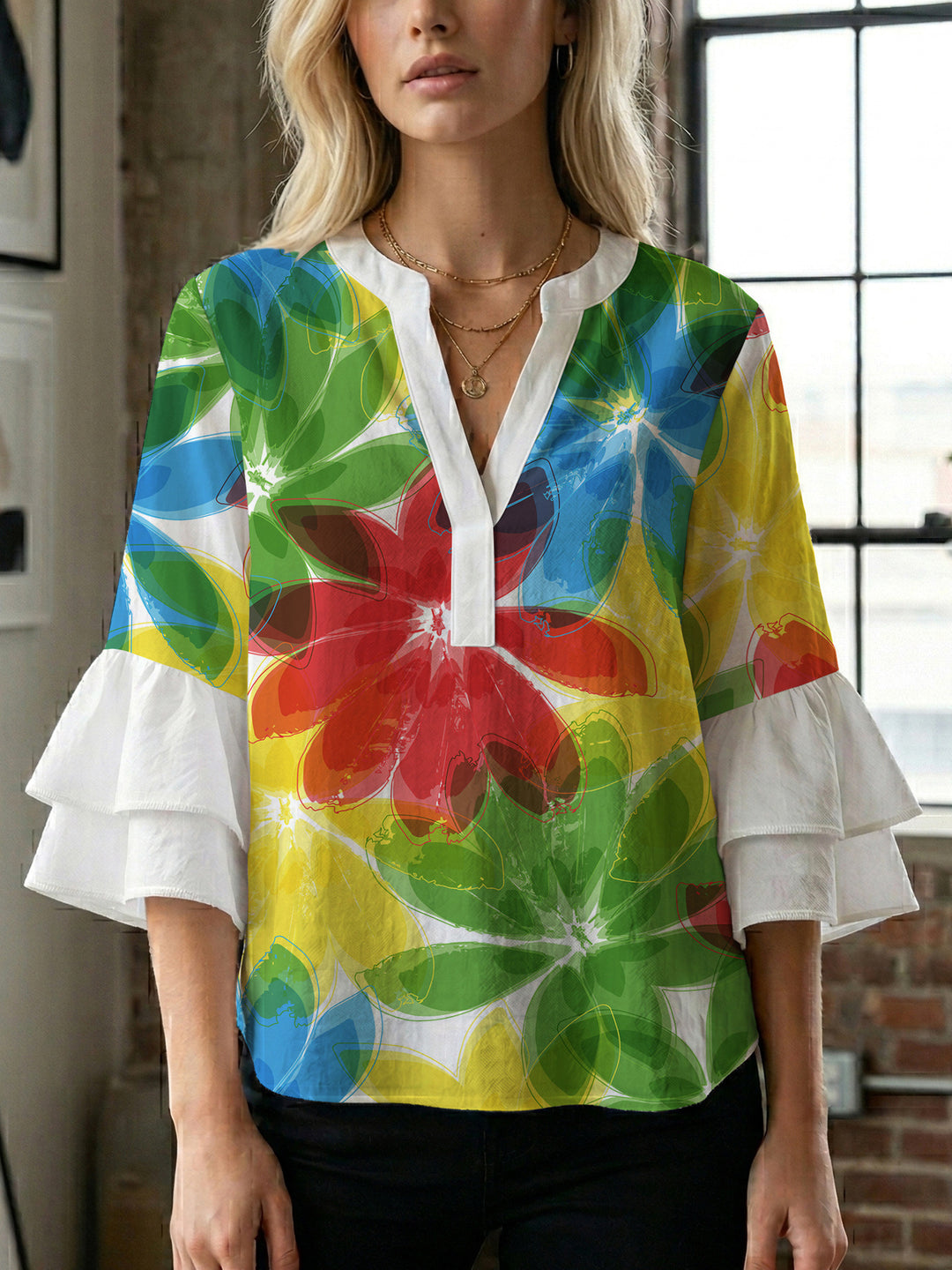 Women’s blouse with voluminous ruffled sleeves and floral pattern Lisslune