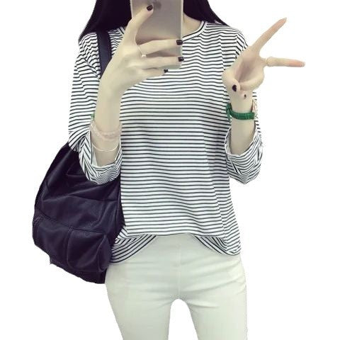Women's striped long-sleeve shirt with soft textured fabric and casual fit