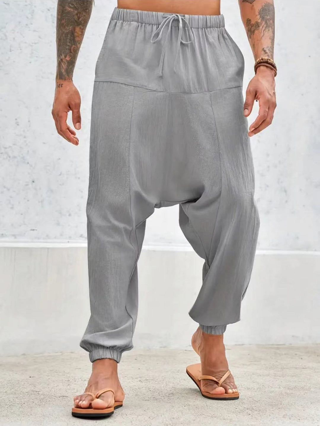 Men's relaxed harem pants with elastic waistband and side pockets Lisslune
