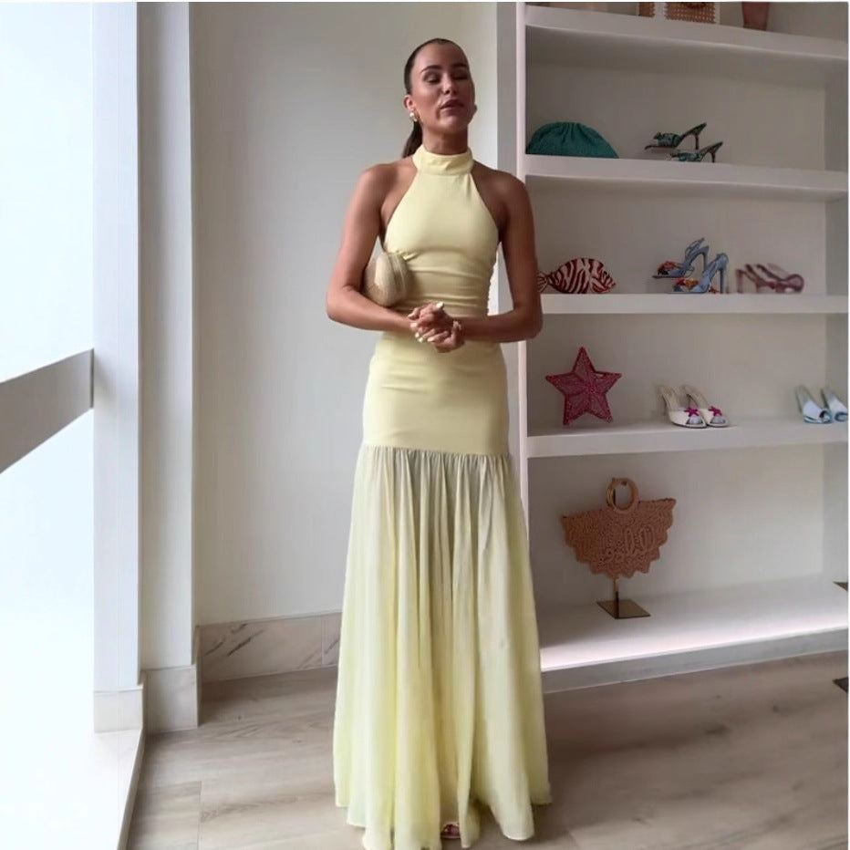 Women's maxi dress with high-neck design and flowing skirt
