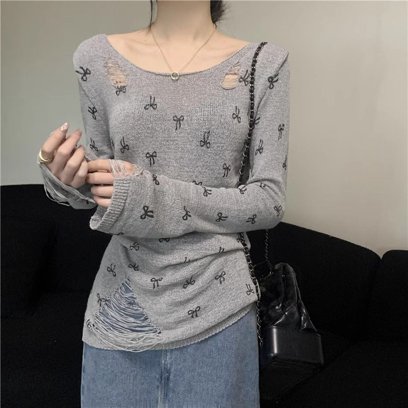 Women's long sleeve shirt with stylish rips and playful motif Lisslune