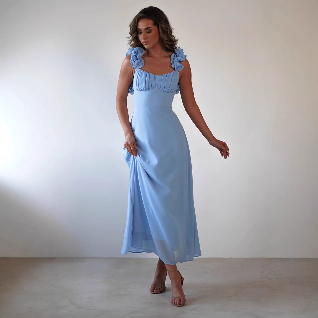 Ladies' maxi dress with playful ruffle details and elastic top