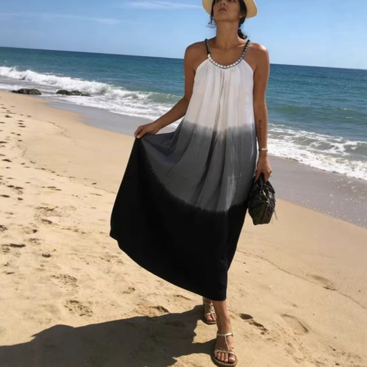 Women's maxi dress with pleated top and embellished straps
