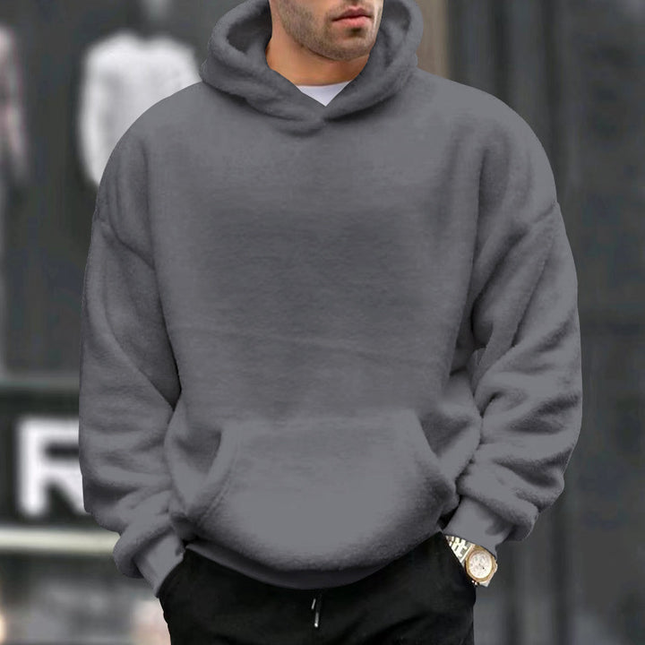 Men's oversized fleece pullover with practical pockets and hood Lisslune