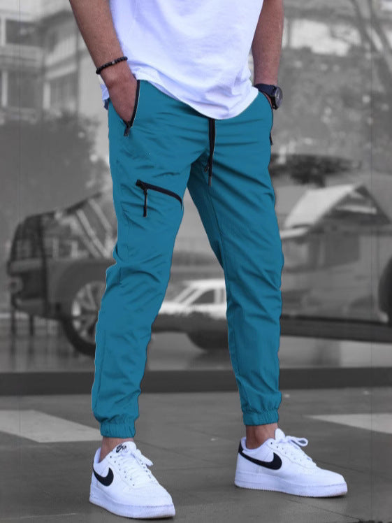 Men's sporty jogging pants with practical zip pockets and elastic waistband Lisslune