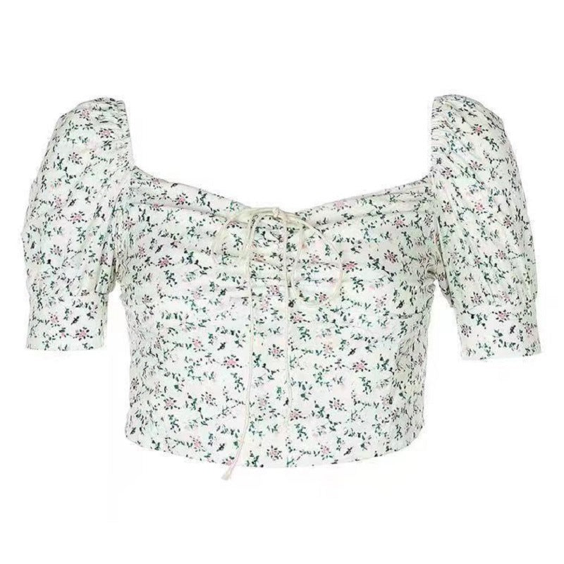 Women’s crop top with puff sleeves and floral design