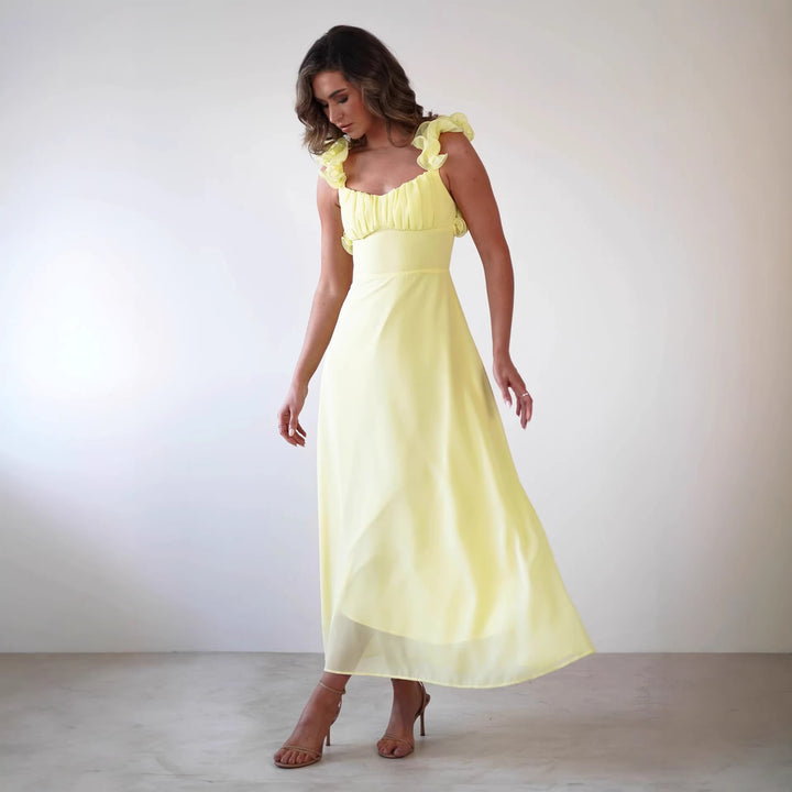 Ladies' maxi dress with playful ruffle details and elastic top