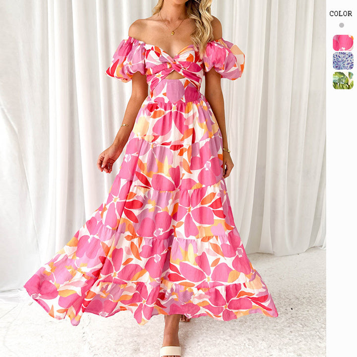Women's maxi dress with voluminous puff sleeves and floral pattern