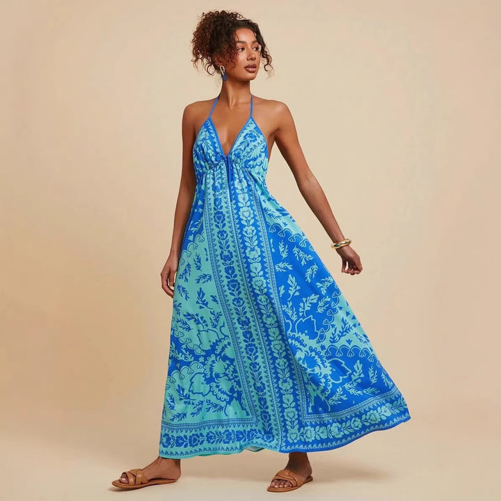Women's maxi dress with deep V-neckline and floral pattern details Lune London