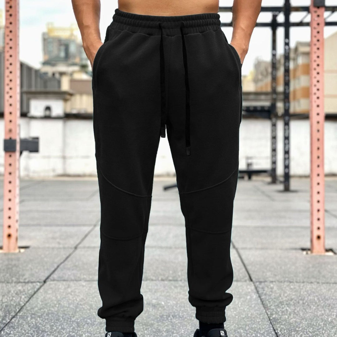 Men's sporty jogging pants with elastic waistband and practical side pockets Lisslune