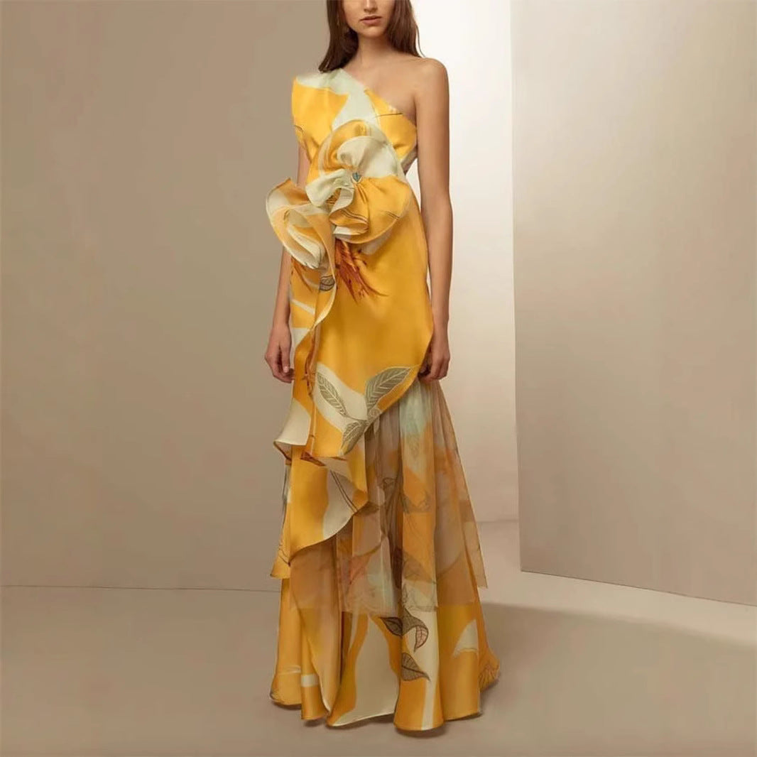 Women's elegant asymmetrical evening dress with flowing skirt and eye-catching ruffle details
