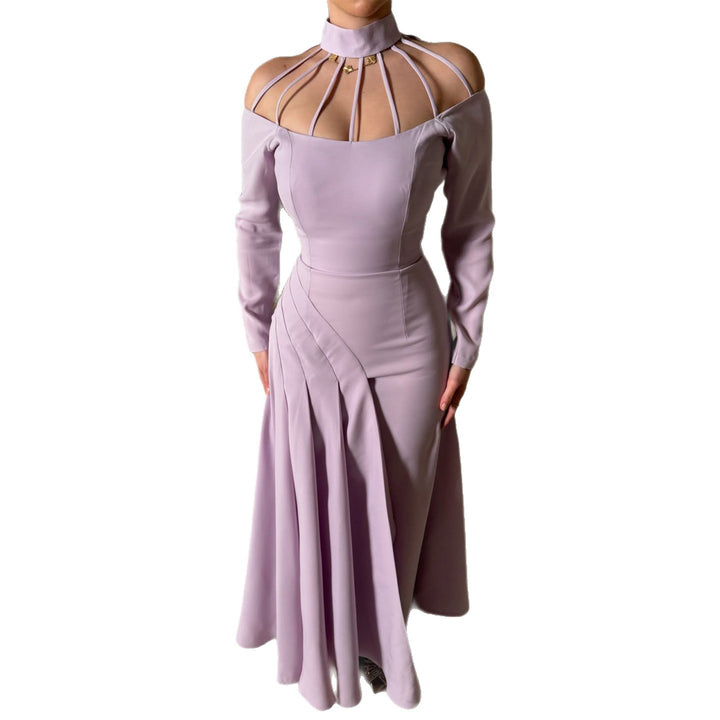 Ladies elegant evening dress with strategic cut-outs and flowing skirt