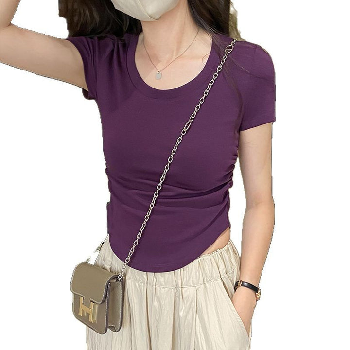 Women's fitted top with elegant round neck and delicate gathering effects