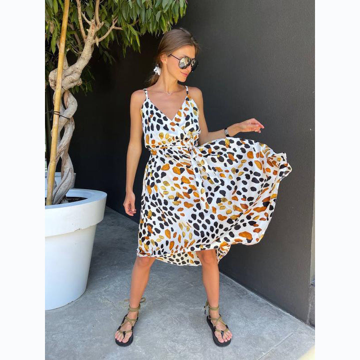 Women's maxi dress with elegant wrap design and stylish ruffle details