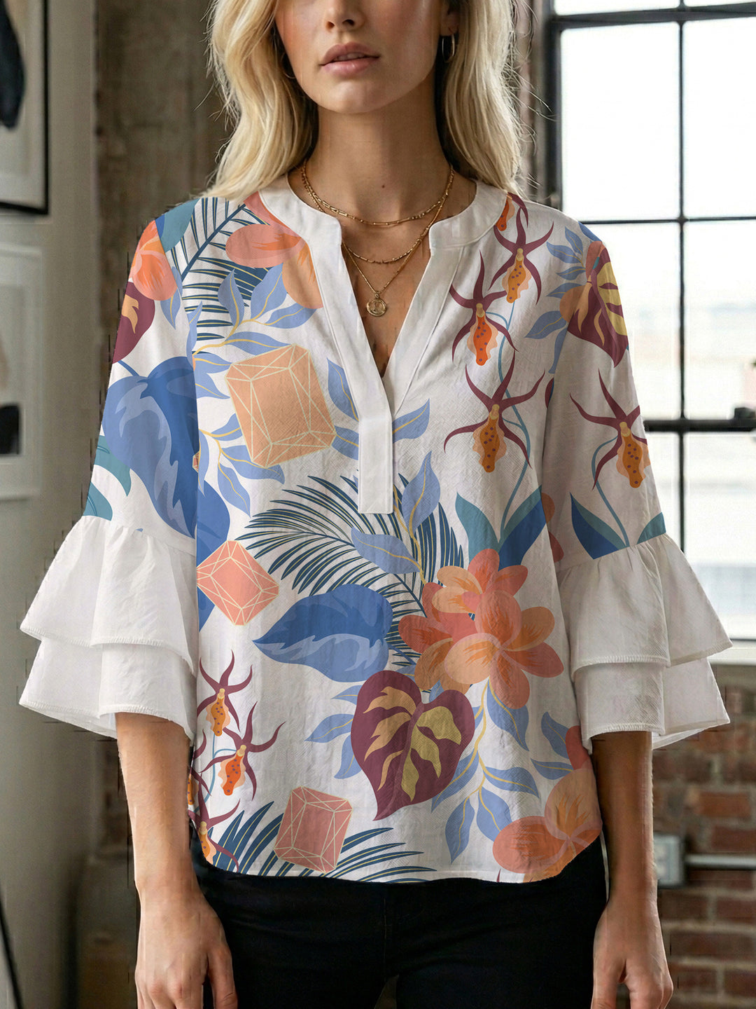Ladies blouse with voluminous ruffled sleeves and floral print Lisslune